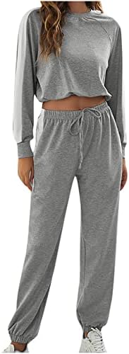 Phенски пижами поставува долги ракави на врвови од вратот, одговараат на еластични половини, долги панталони, мека облека за спиење, обични